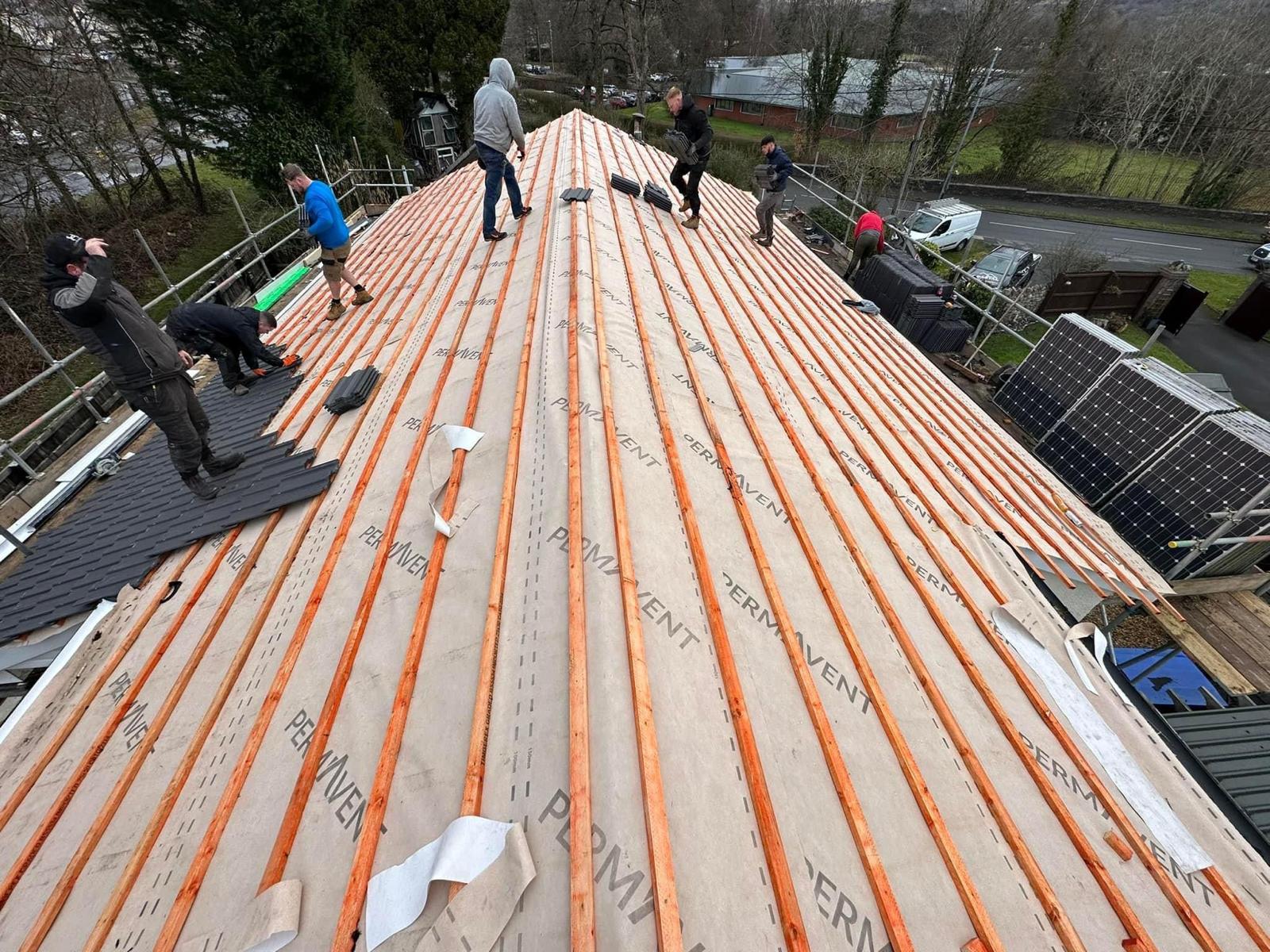 Cityedge construction team carrying out a full roof re-batten